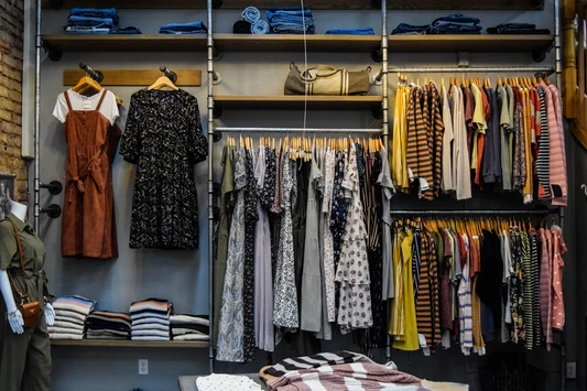 Curated clothing collection on display